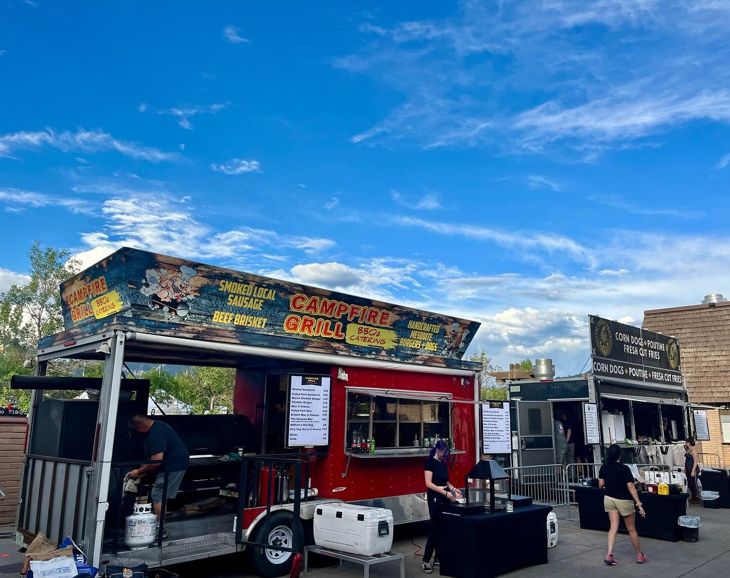 Both Sixon trucks side by side at an outdoor event