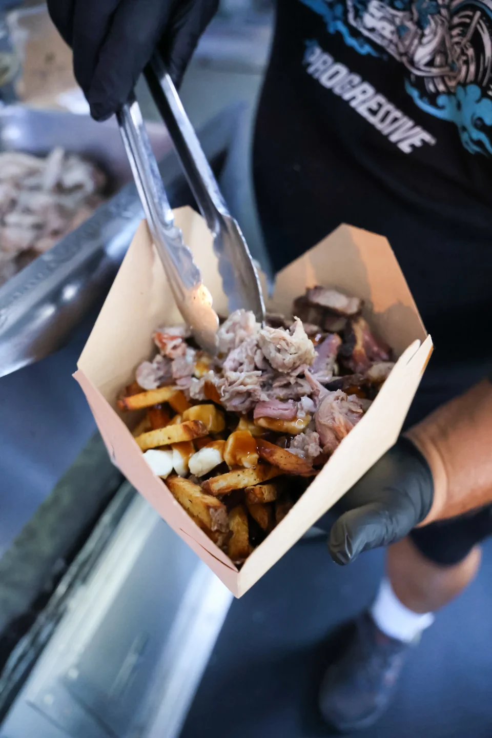 Close-up of pulled pork poutine ready to serve