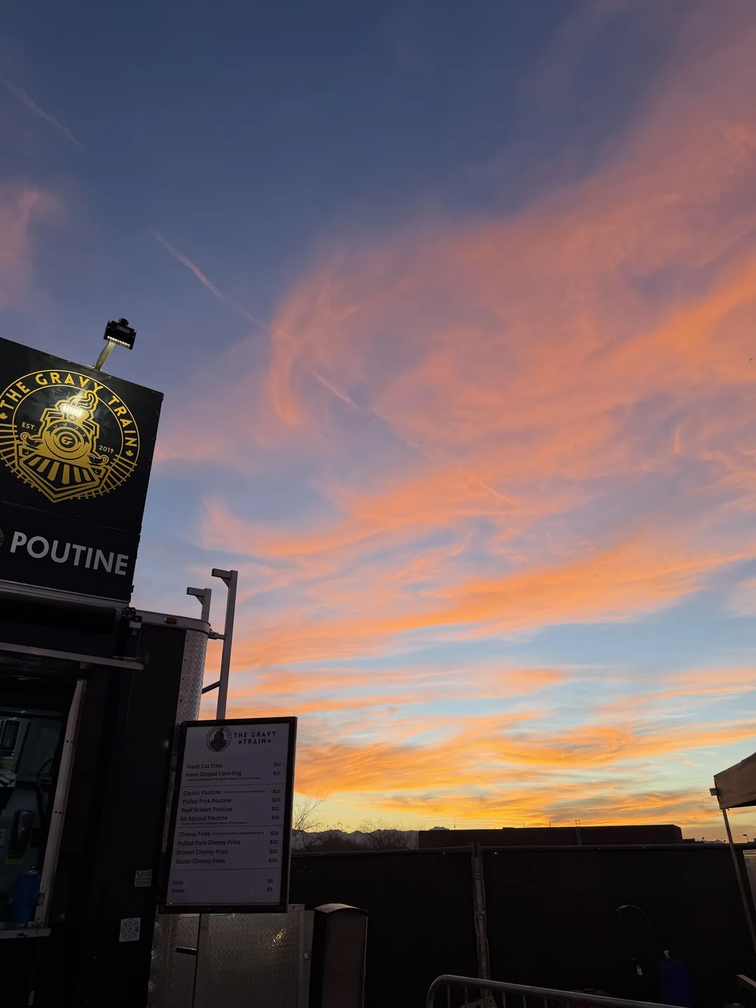 The Gravy Train with a vivid sunset sky overhead