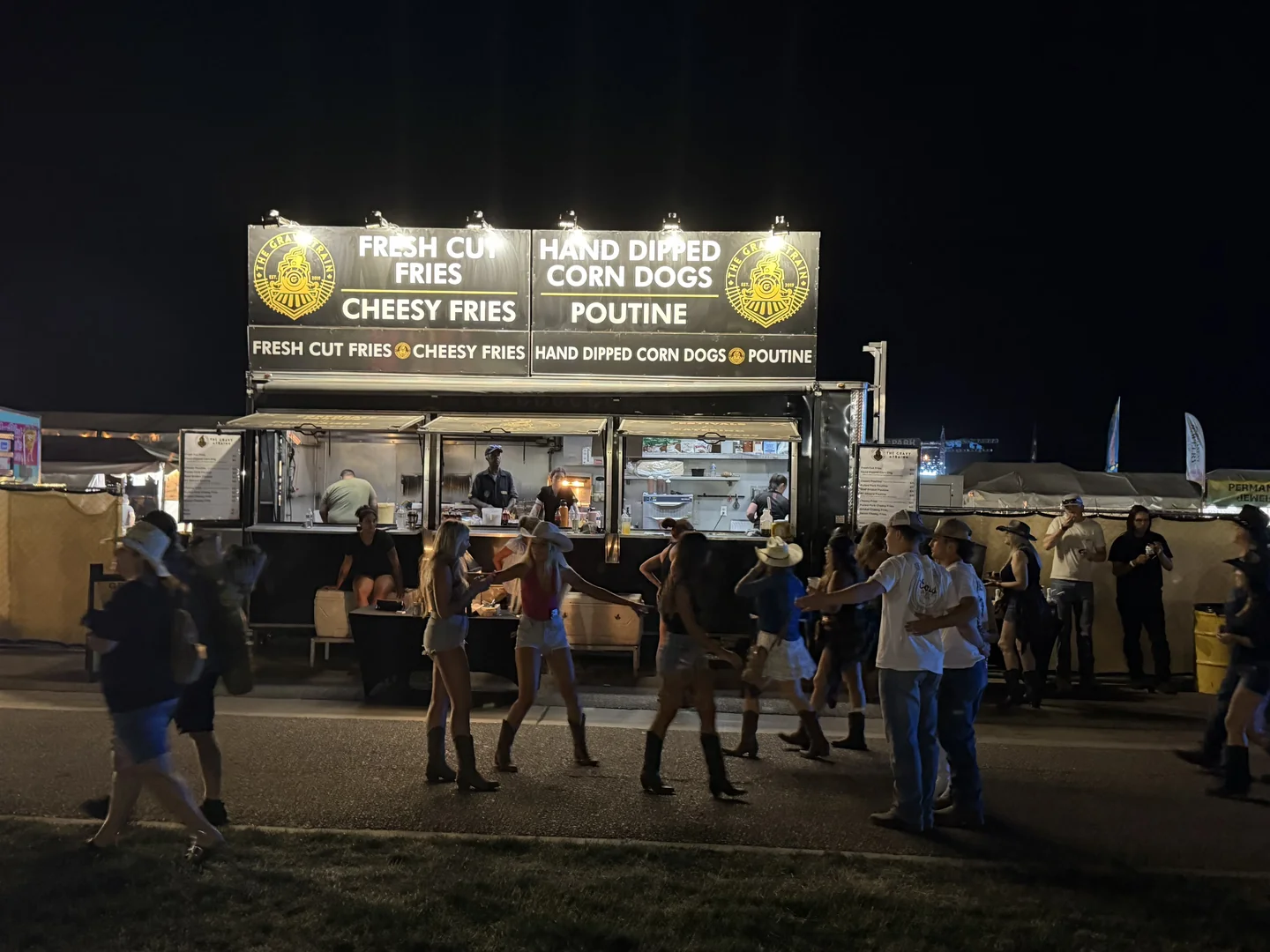 Nighttime crowd at Chief Joseph Days Rodeo with The Gravy Train